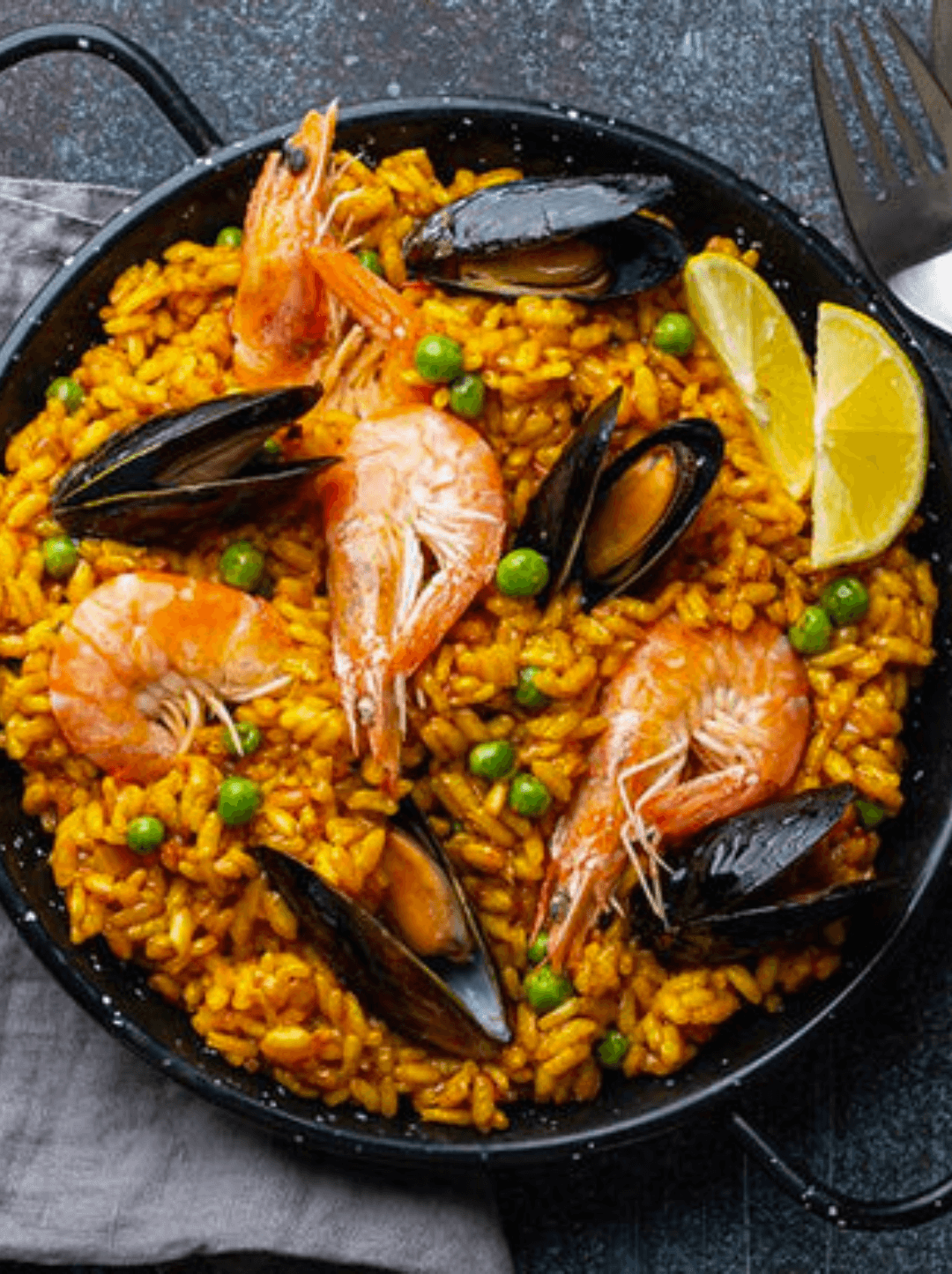 Paella a la valenciana preparado con aceite de oliva O-Live & Co