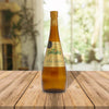 Botella de 1 Lt de Aceite Santiago Premium sobre una mesa de madera