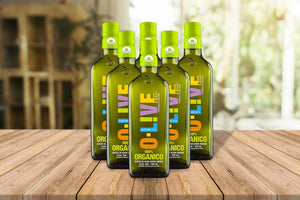 5 botellas de 750 ml de O-Live&Co Orgánico sobre una mesa de madera